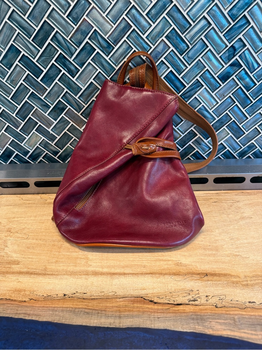 Leather Convertible Sling/Backpack in Burgundy with Tan Strap